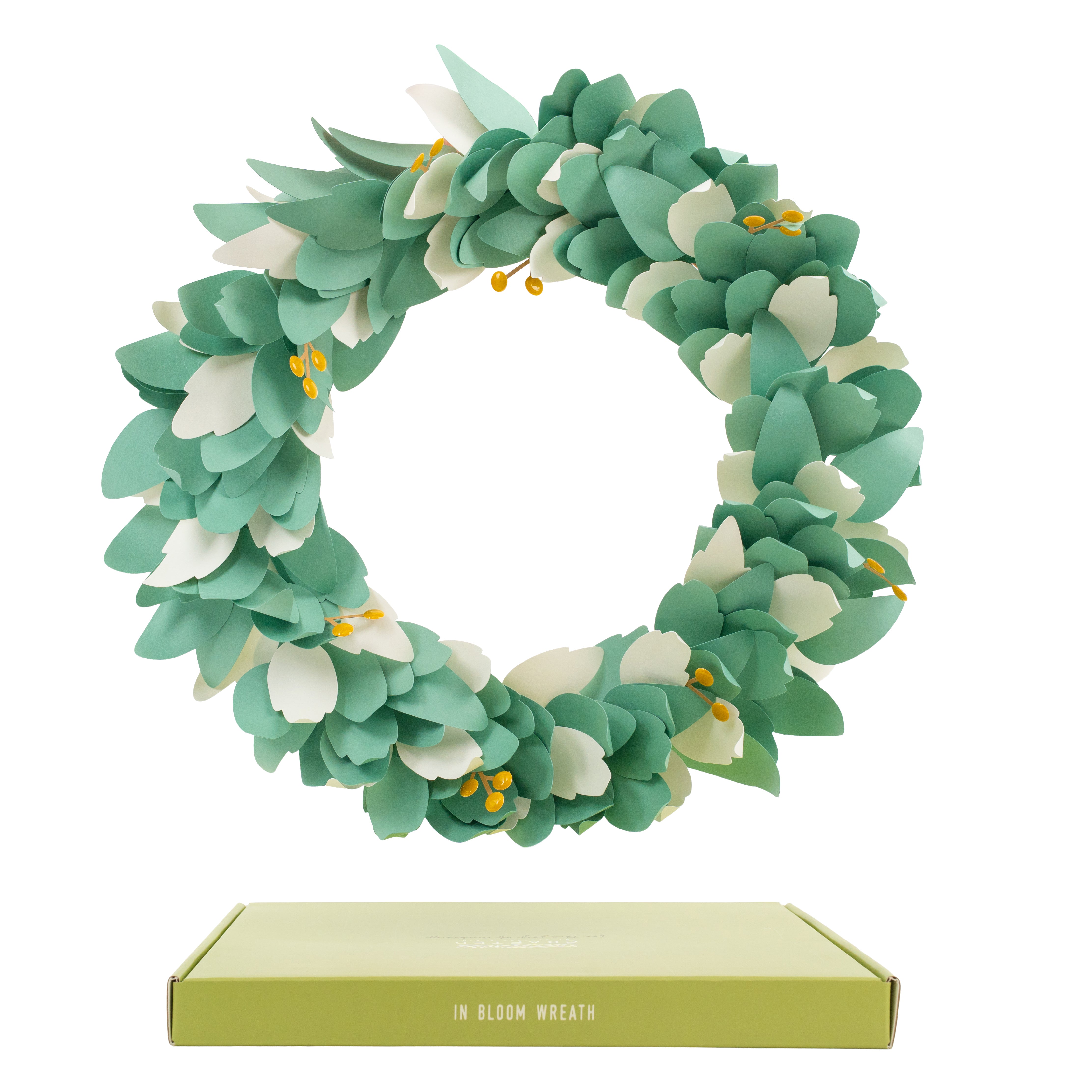 DIY paper wreath kit for spring with ivory and eucalyptus colored sprigs and yellow colored berries