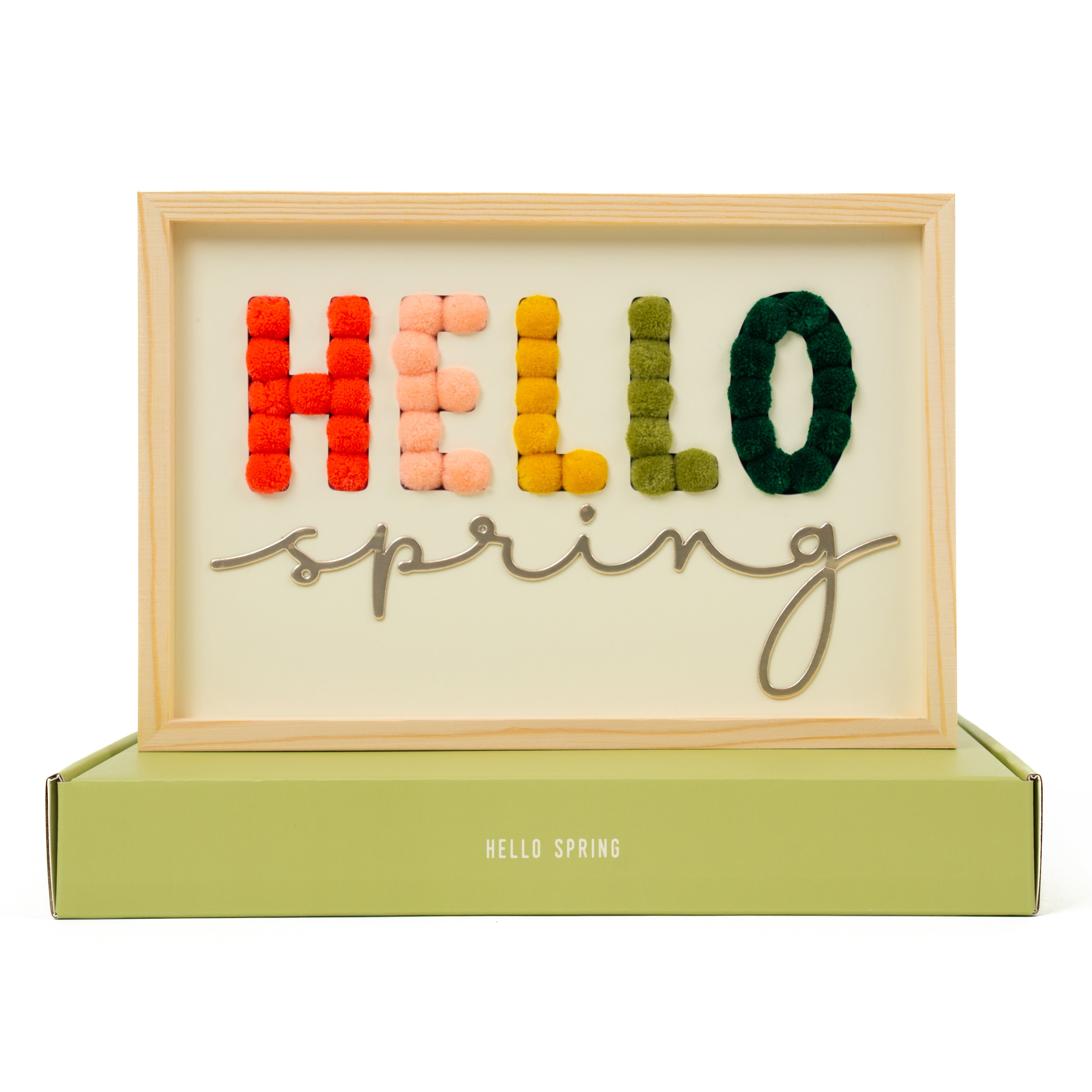 Decorative sign with colorful letters spelling 'HELLO SPRING' in a wooden frame. DIY kit.