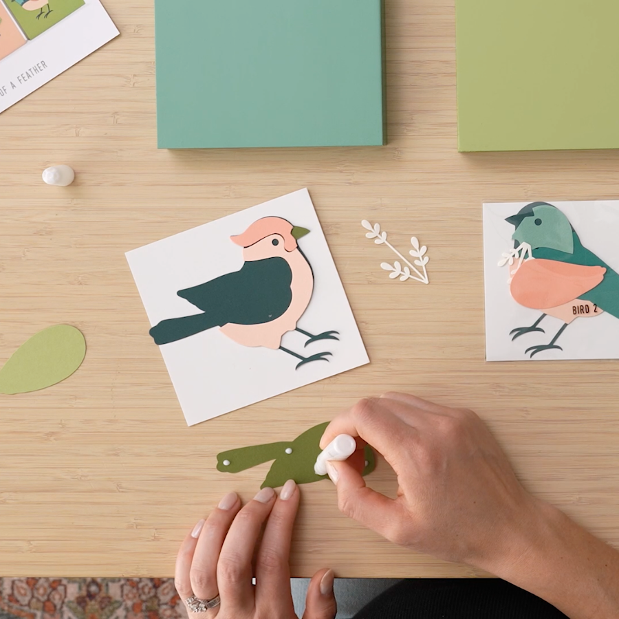 adult woman hands making a bird craft for spring